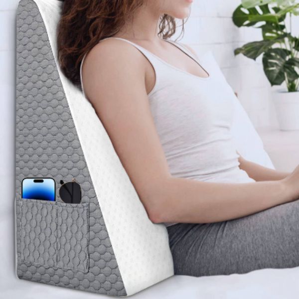 Elevated bed outlet pillow